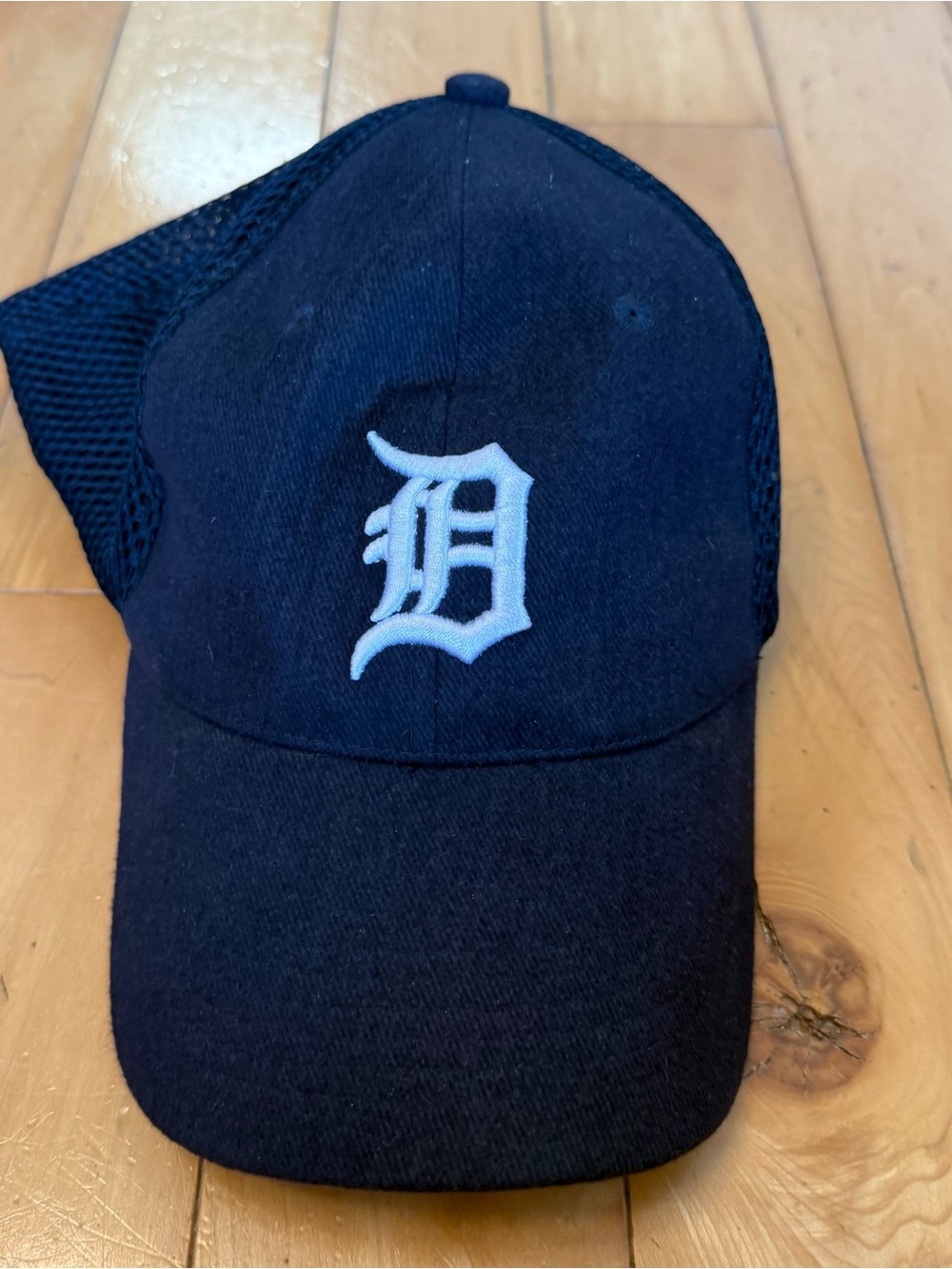 Black Trucker Cap with White 'D' Embroidered Logo
